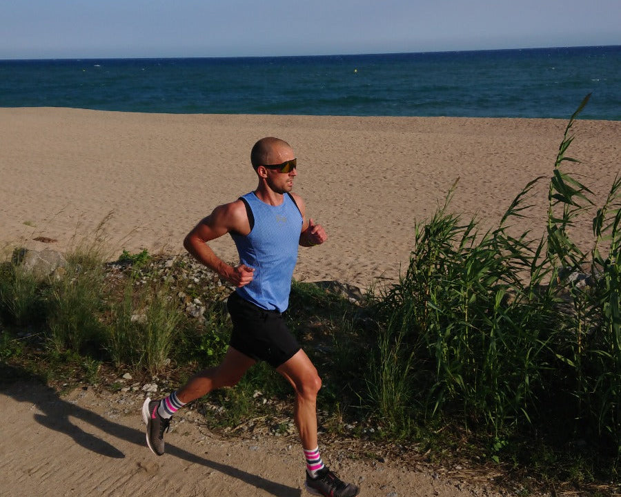 "Experience ultimate comfort and performance with THE Fe226 Running Singlet. Featuring our exclusive perfect-fit four-panel construction, this singlet is lightweight, quick-drying, and well-ventilated. Enjoy odor-free high quality fabric, ensuring a comfortable and fresh run every time. Elevate your running experience with Fe226."