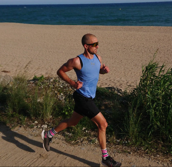 "Experience ultimate comfort and performance with THE Fe226 Running Singlet. Featuring our exclusive perfect-fit four-panel construction, this singlet is lightweight, quick-drying, and well-ventilated. Enjoy odor-free high quality fabric, ensuring a comfortable and fresh run every time. Elevate your running experience with Fe226."