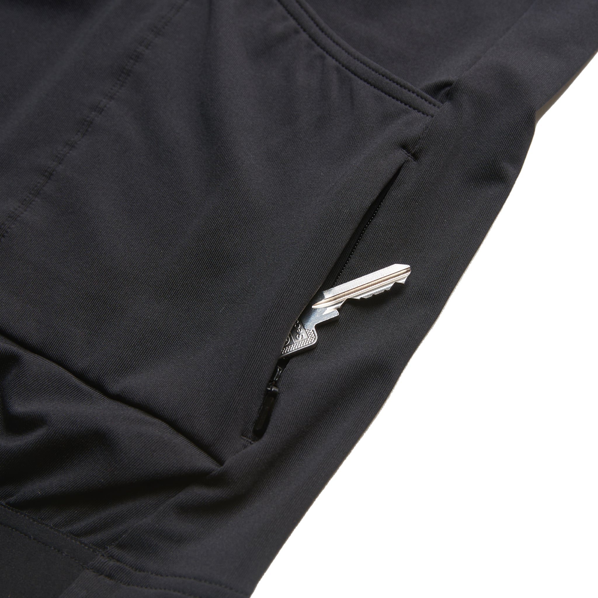 "The Fe226 Black Cycling Jersey combines an aerodynamic race fit with a comfortable feel, featuring three back pockets, a zipped security pocket, and reflective logo prints for enhanced visibility in low-light conditions. This high-quality, odorless summer cycling jersey is designed for road cycling, gravel riding, mountain biking, triathlon training, commuting, and racing."