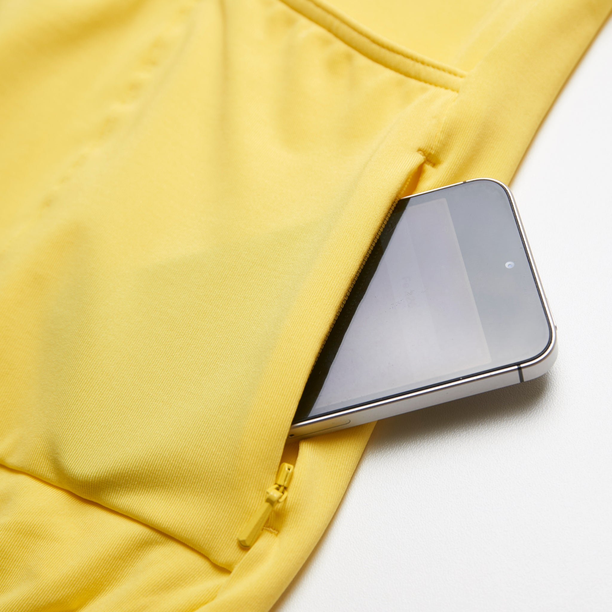 "The Fe226 High Visibility Cycling Jersey offers an aerodynamic race fit coupled with comfort, including three back pockets, a zipped security pocket, and reflective logo prints for enhanced visibility in low light conditions. Ideal for road cycling, gravel riding, mountain biking, triathlon training, commuting, and racing, this high-quality, odorless summer cycling jersey ensures performance and safety on the road."